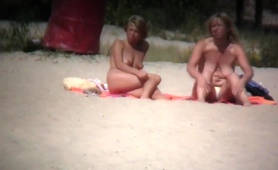 Two Busty Milfs Expose Their Wonderful Bodies On The Beach