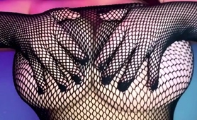 voluptuous-milf-in-fishnets-exposes-her-massive-natural-tits