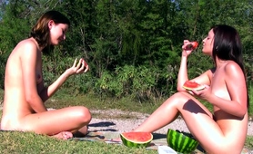 Naked Teens Enjoying The Sun And Eating Watermelon Outdoors